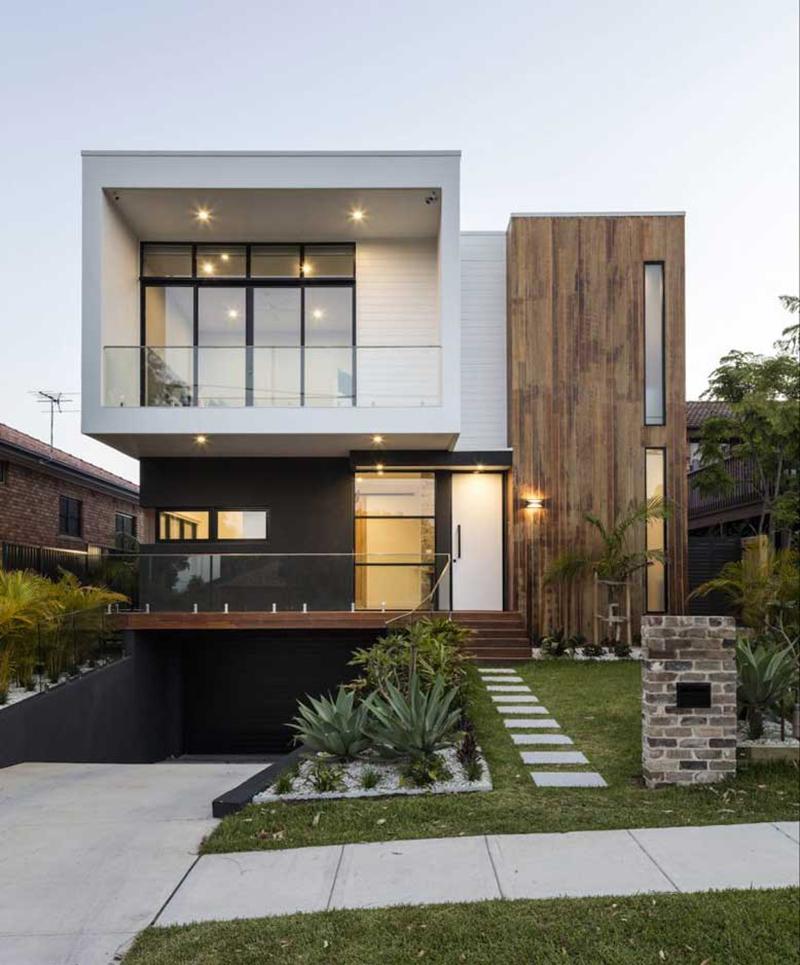 Thiết kế tầng trệt bao gồm các không gian sinh hoạt chung và khu vực đỗ xe