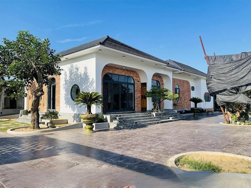 Mẫu nhà vườn mái Nhật cân đối và gọn gàng