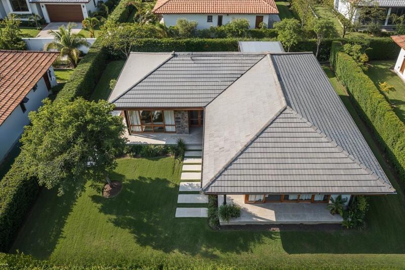 Mẫu thiết kế nhà vườn chữ L được phân chia không gian hợp lý, thuận tiện nhưng vẫn đảm bảo riêng tư