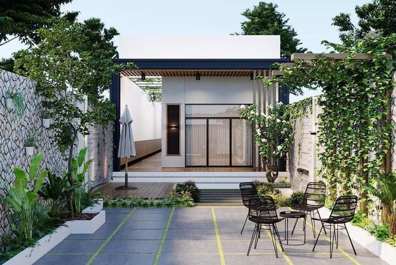 Mẫu sân vườn nhỏ trước nhà cấp 4 mái bằng kết hợp tiểu cảnh làm điểm nhấn